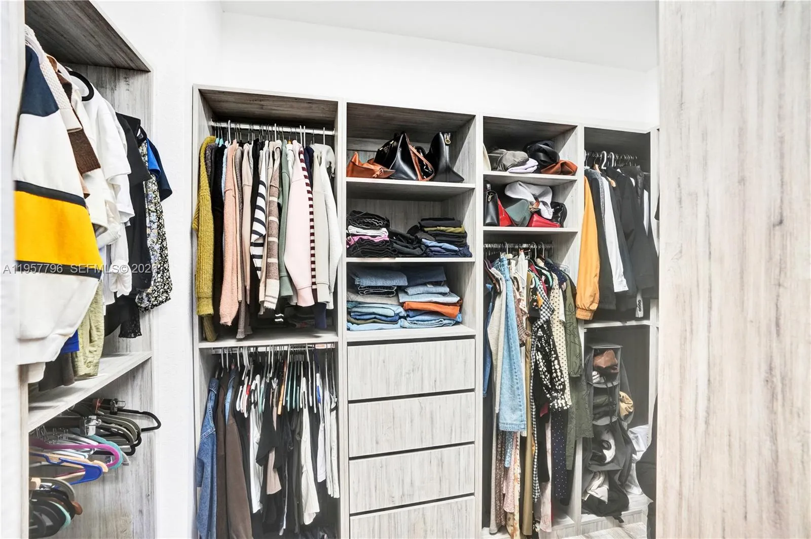 WALK IN CLOSET PRIMARY BEDROOM