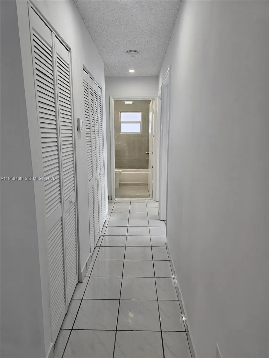 Hallway towards bedrooms and guest bath