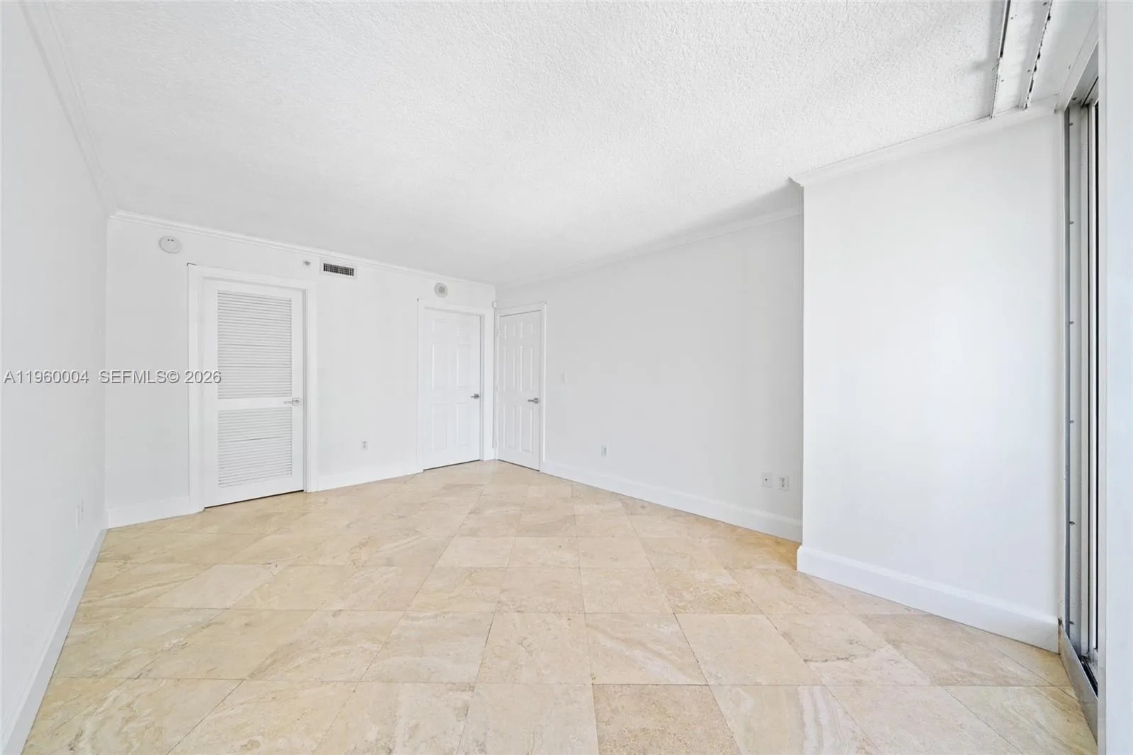 Primary bedroom features a walk-in closet, en-suite bathroom, and bay views