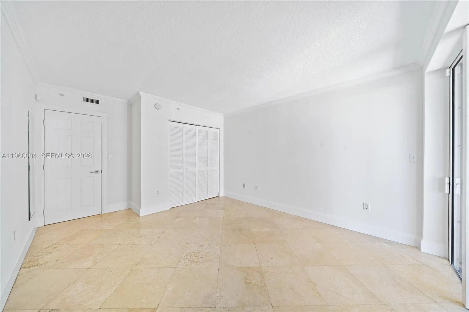 Second bedrooms offers privacy on the opposite end of the unit, with its own access to the balcony.