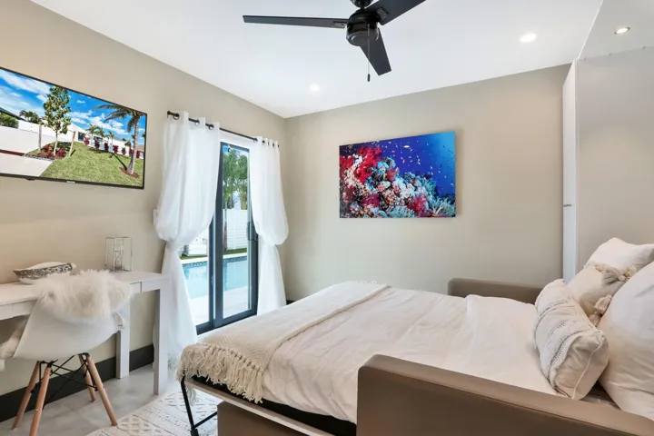 Bedroom with sliders to patio