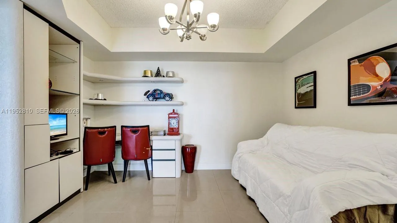 Den, office or formal dinning room.