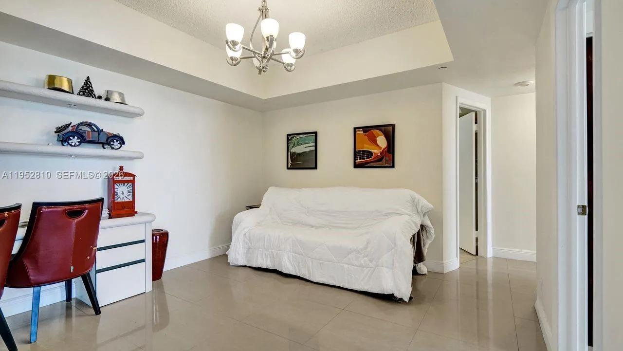 Den, office or formal dinning room.