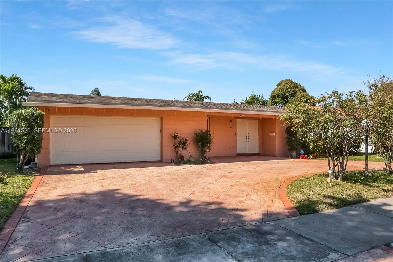 Large Circular driveway plus 2 Car Garage can accommodate many vehicles