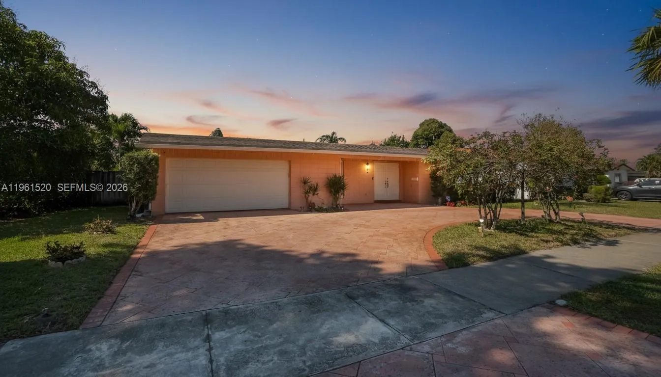 Large Circular driveway plus 2 Car Garage can accommodate many vehicles