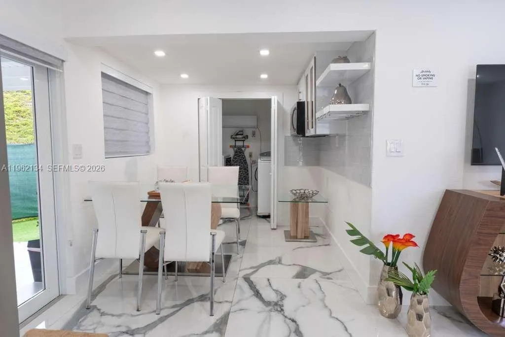 Laundry area at the end of the dining room.