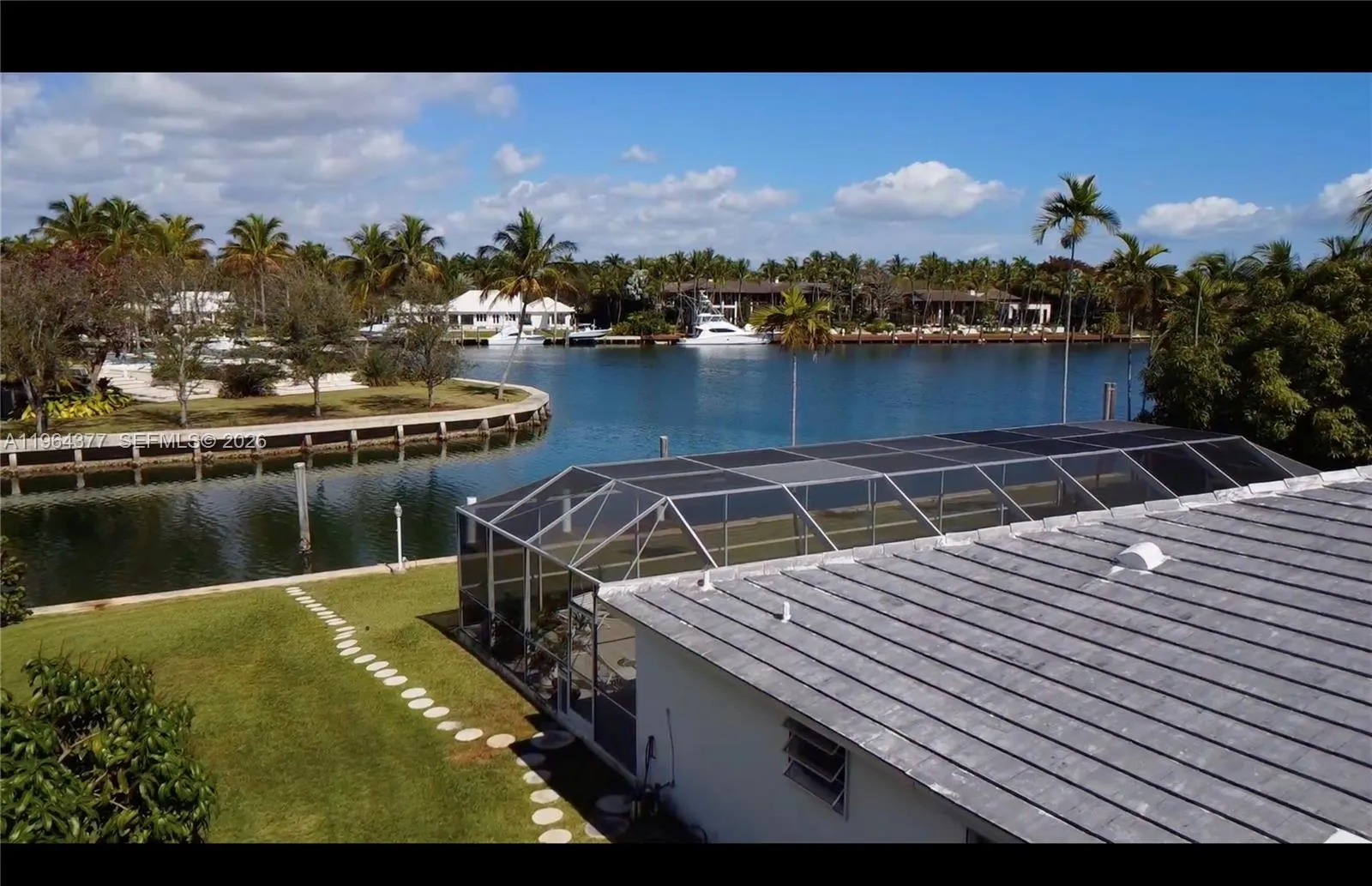 Views of the compound across the lagoon (which is on the market for $175 million)