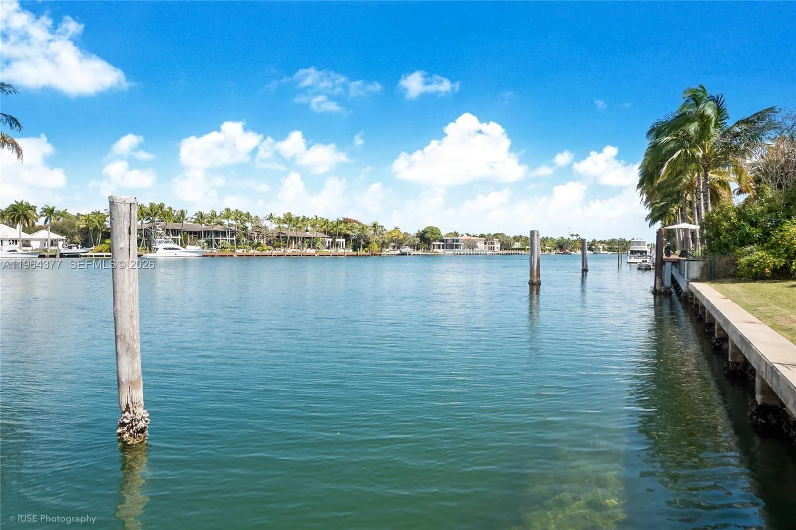 Views of the compound across the lagoon (which is on the market for $175 million)