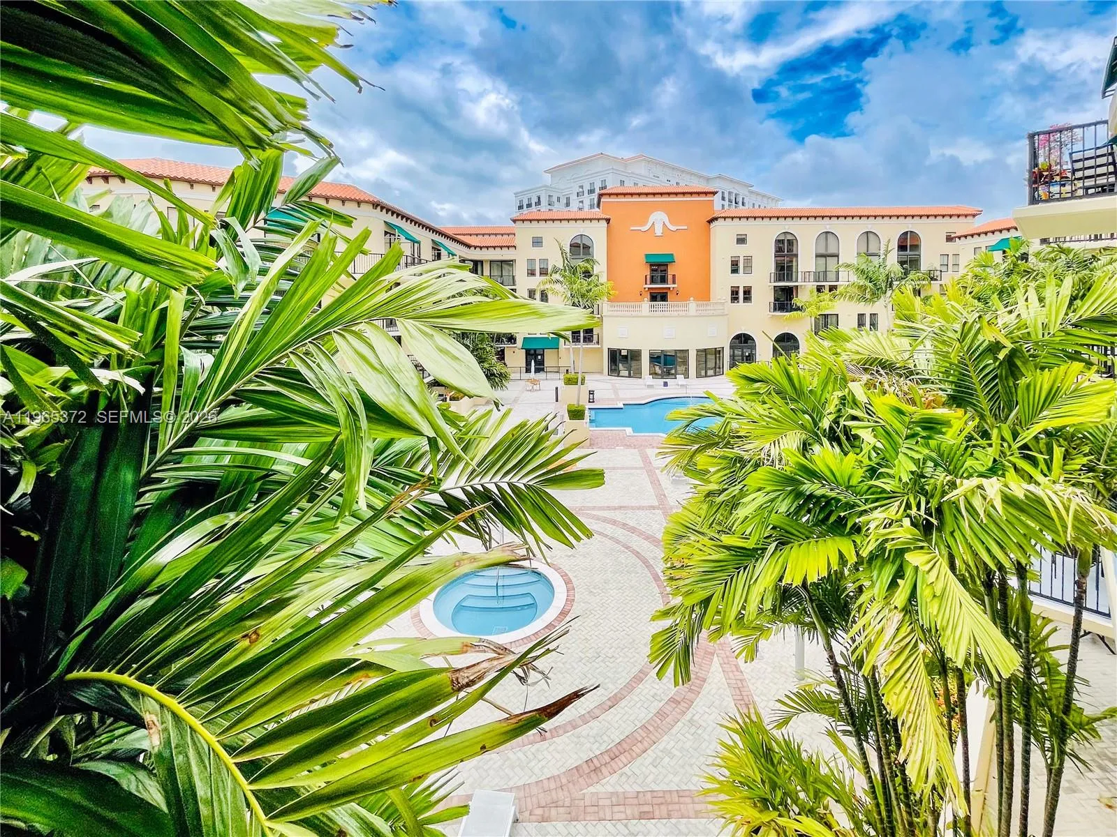 Pool and jacuzzi area located inside building