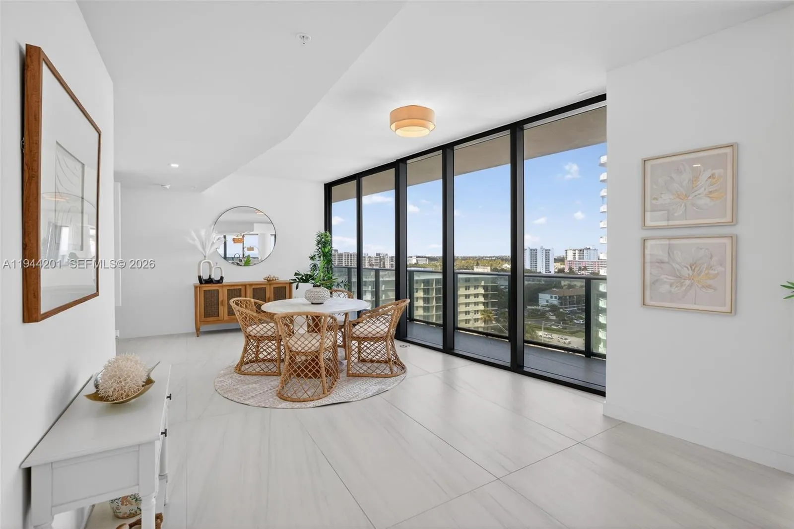 Open dining area with floor to ceiling glass, adjacent to chef’s kitchen and terrace for seamless indoor outdoor entertaining. This area is also a possible den / 4th bedroom as per the builders plans. Unit is a 4 bedroom per tax roll