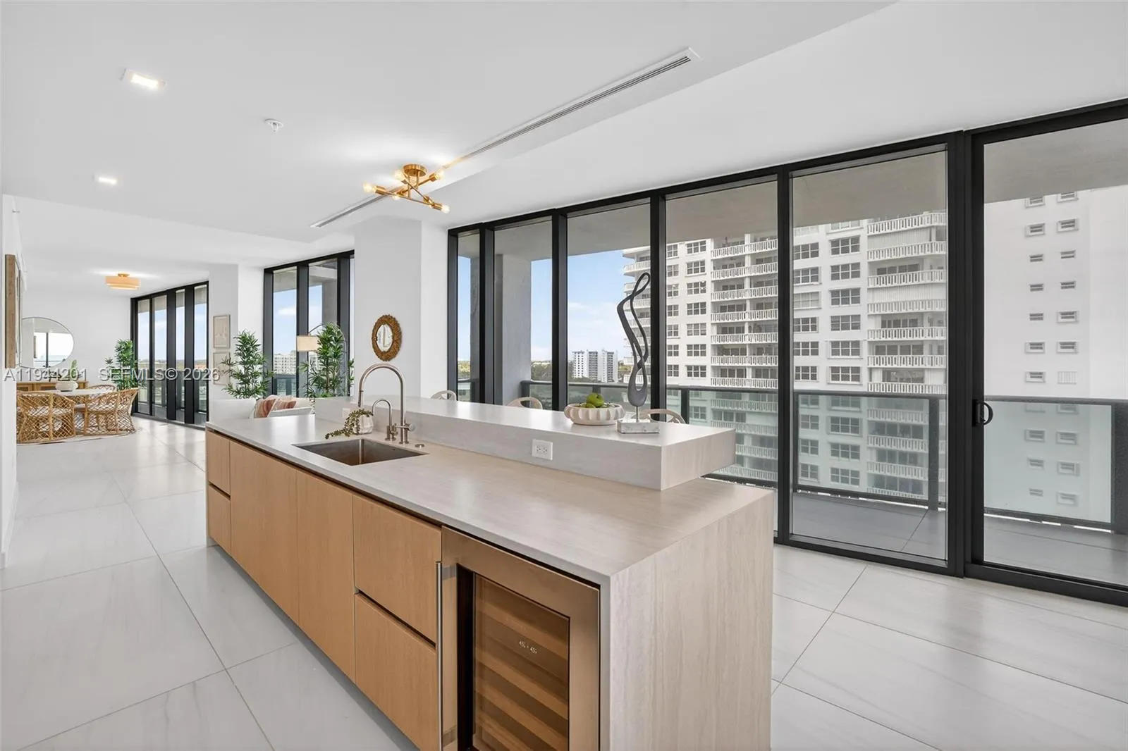 Chef-ready galley kitchen with Sub-Zero and Wolf appliances w/ wine cooler, plus integrated espresso/cappuccino system. Italian cabinetry and stone counters. Gas Cooktop