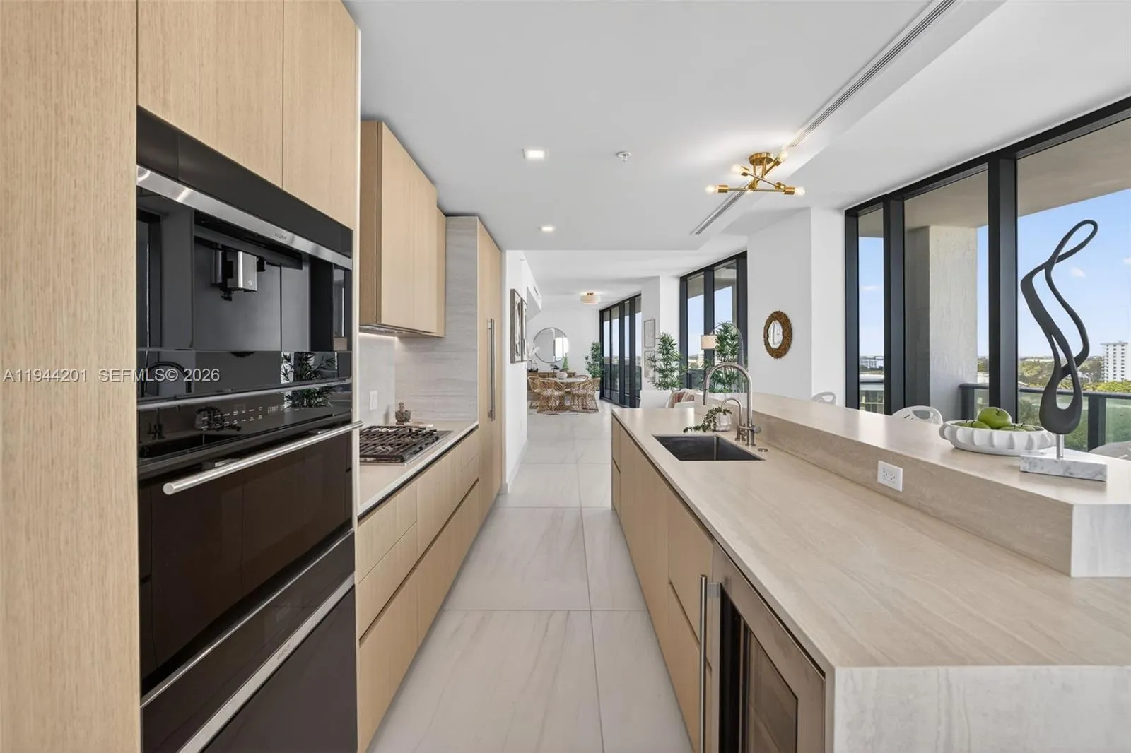 Chef-ready galley kitchen with Sub-Zero and Wolf appliances w/ wine cooler, plus integrated espresso/cappuccino system. Italian cabinetry and stone counters