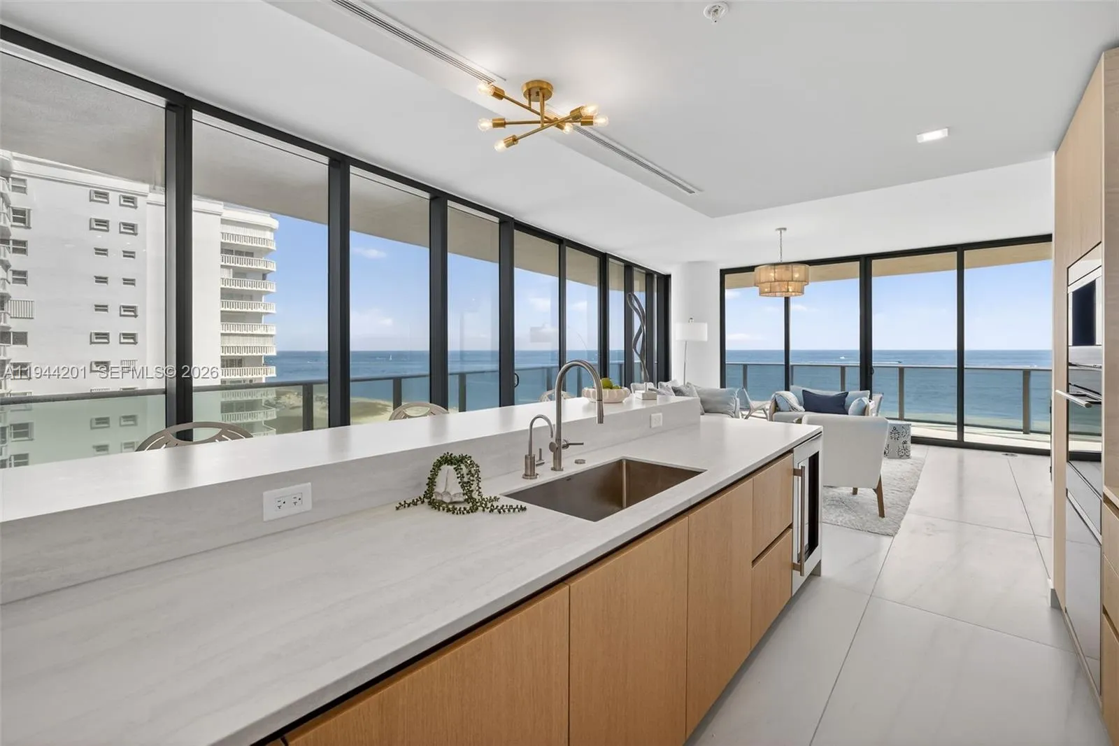 Chef-ready galley kitchen with Sub-Zero and Wolf appliances w/ wine cooler, plus integrated espresso/cappuccino system. Italian cabinetry and stone counters. Gas Cooktop