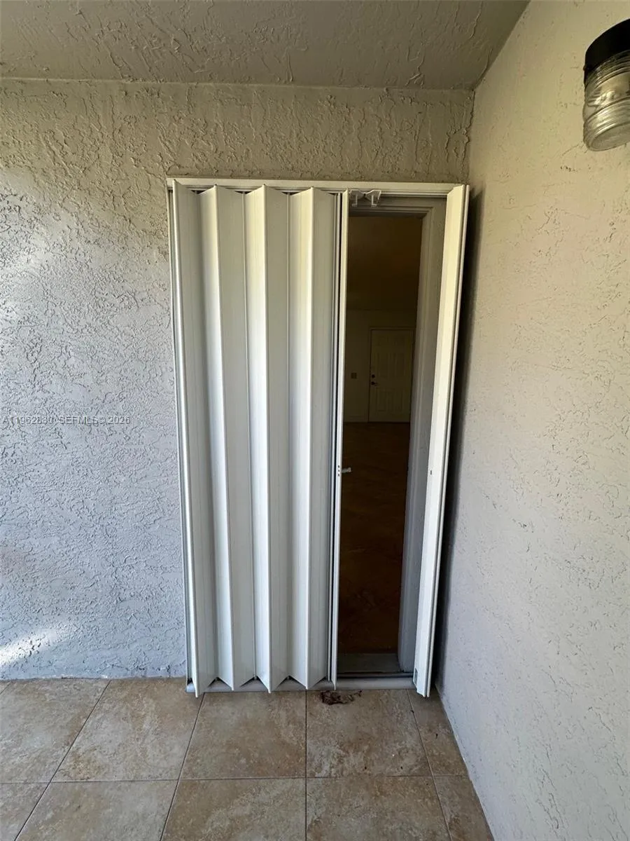hurricane accordion shutters