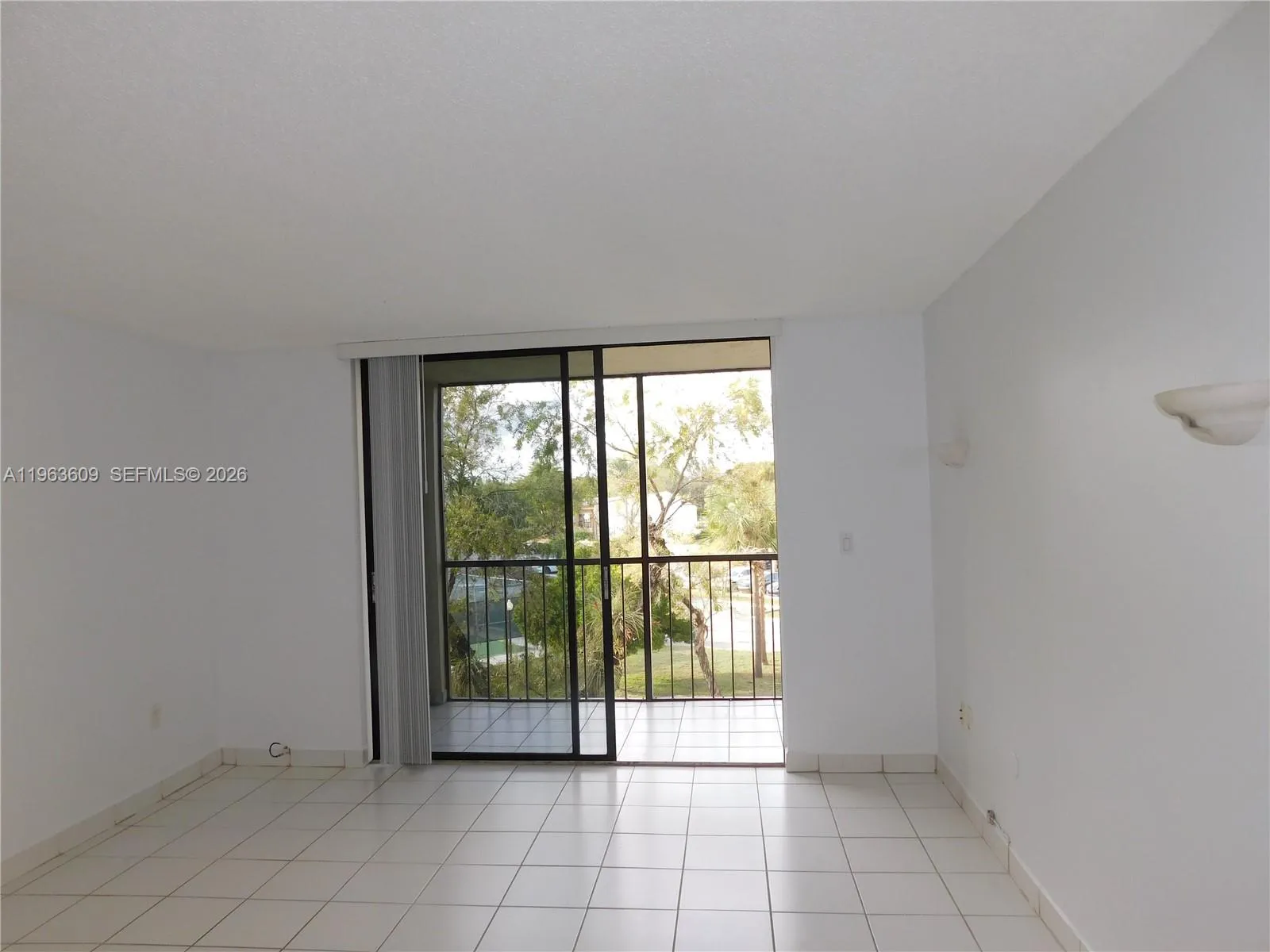 LEADING TO SCEENED PATIO W/STORAGE ROOM