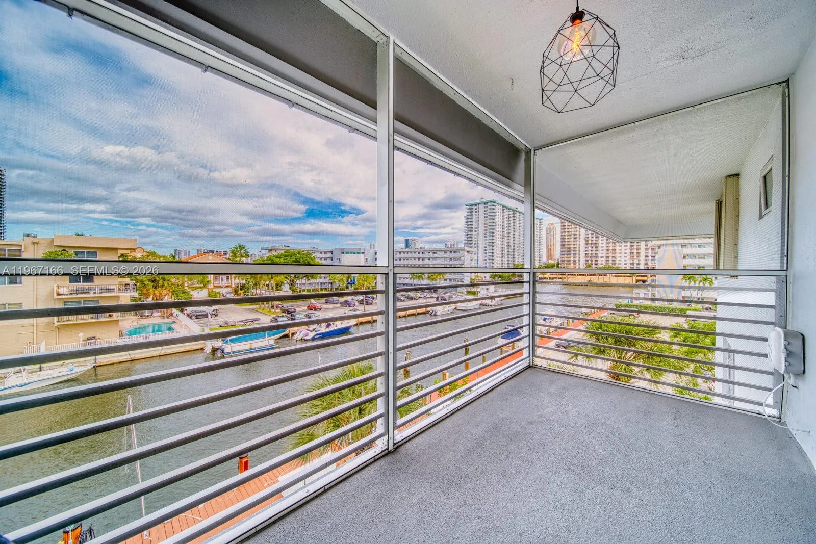 Balcony - Relax on your private screened balcony with stunning canal and Intracoastal views.