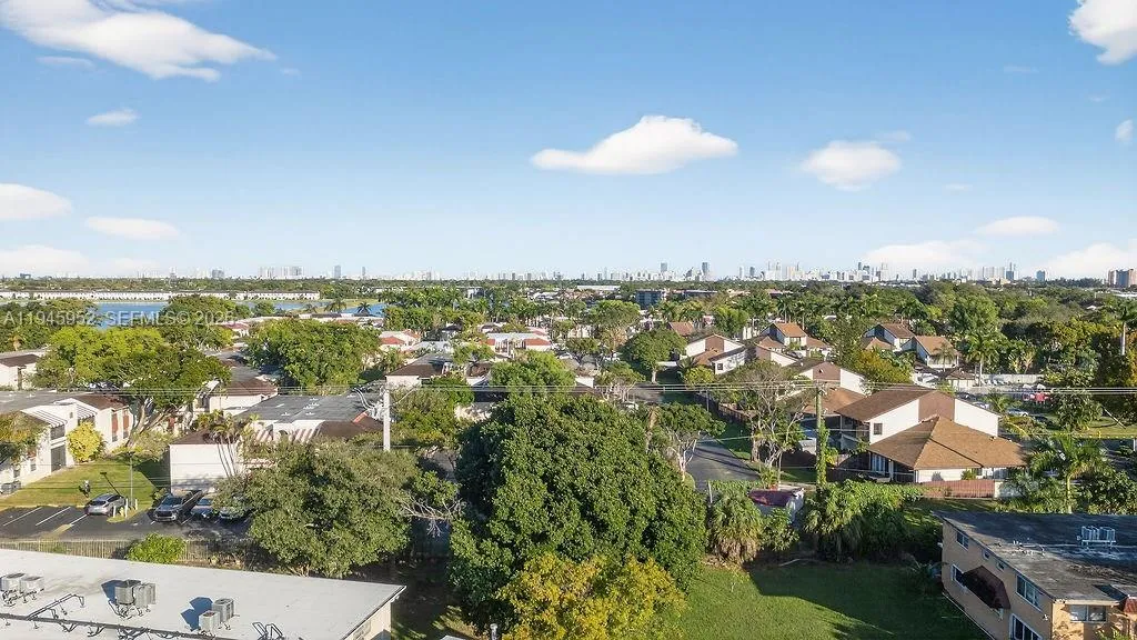 Aerial view of the building at 20311 NE 2nd Ave, Apt J15, located in a 55+ HOPA community in North Miami, with convenient access to major roads and nearby amenities.