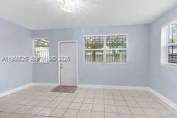 Living room with door to patio