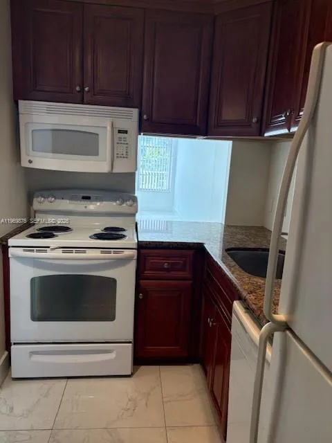 Opens to Dining/Living Room