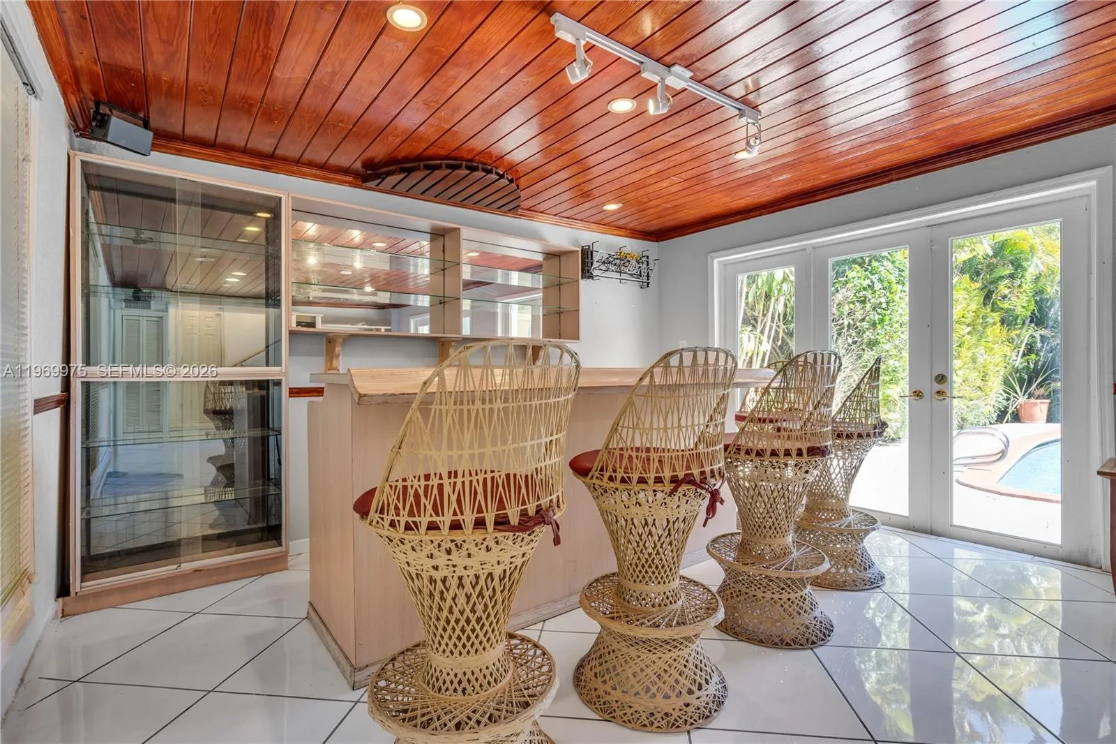Separate bar area overlooking the pool.