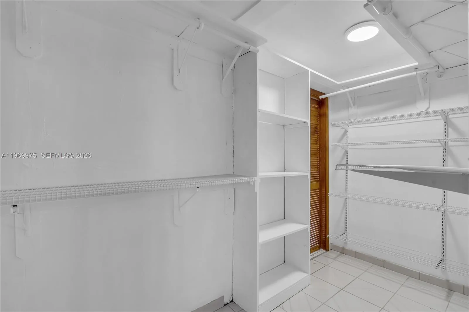Walk in closet for upstairs bedroom.