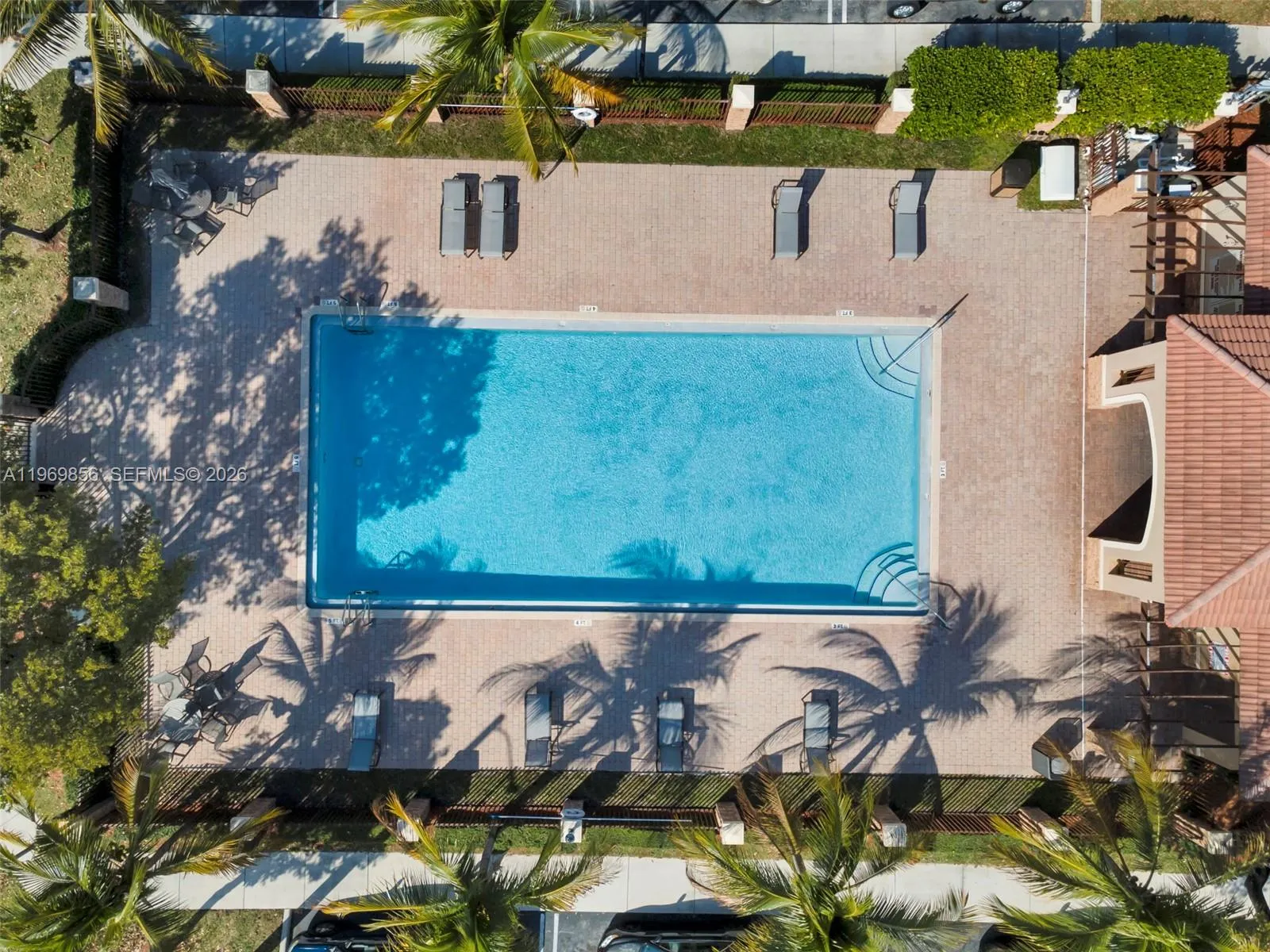 second community pool steps from property