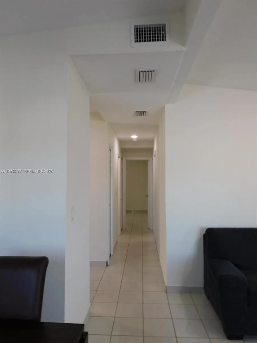 Hallway leading to bedrooms.
