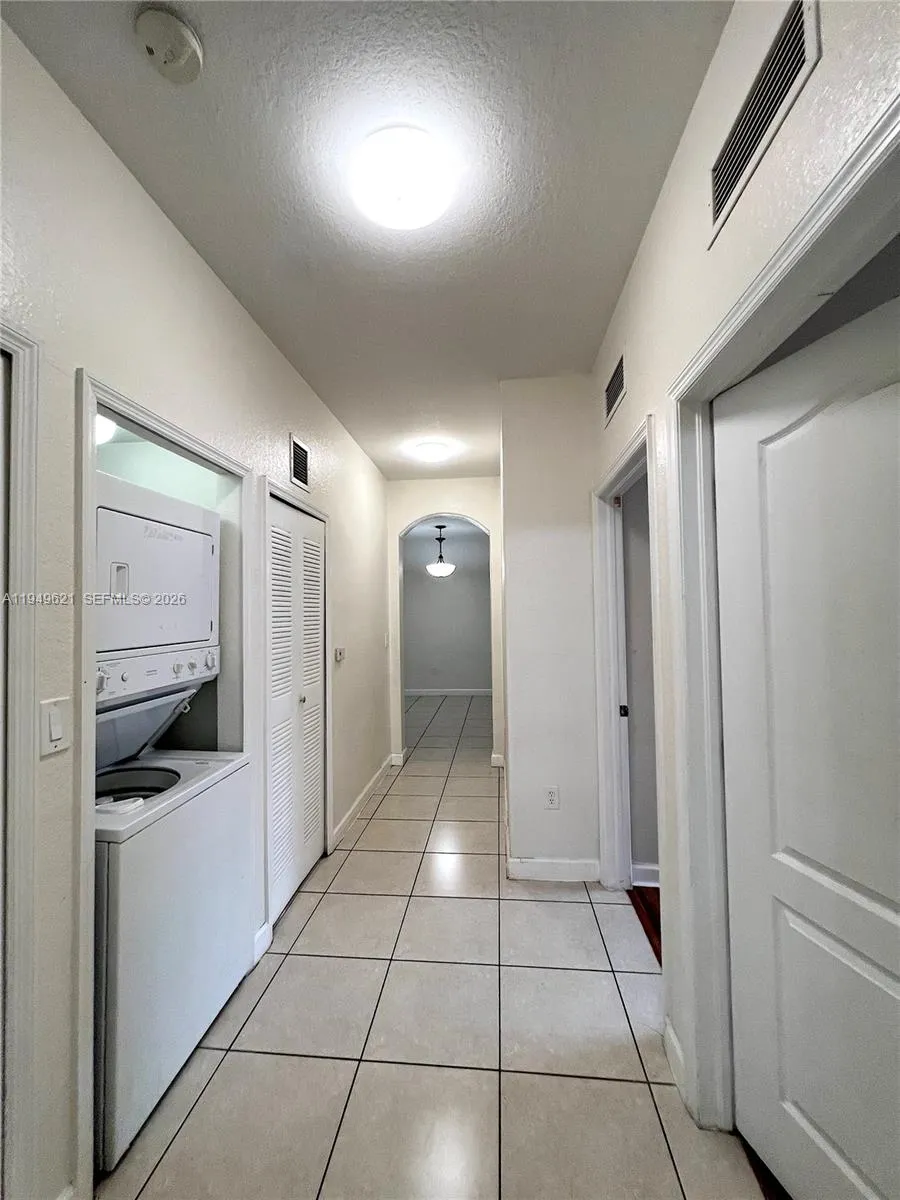 Hallway to other 2 bedrooms