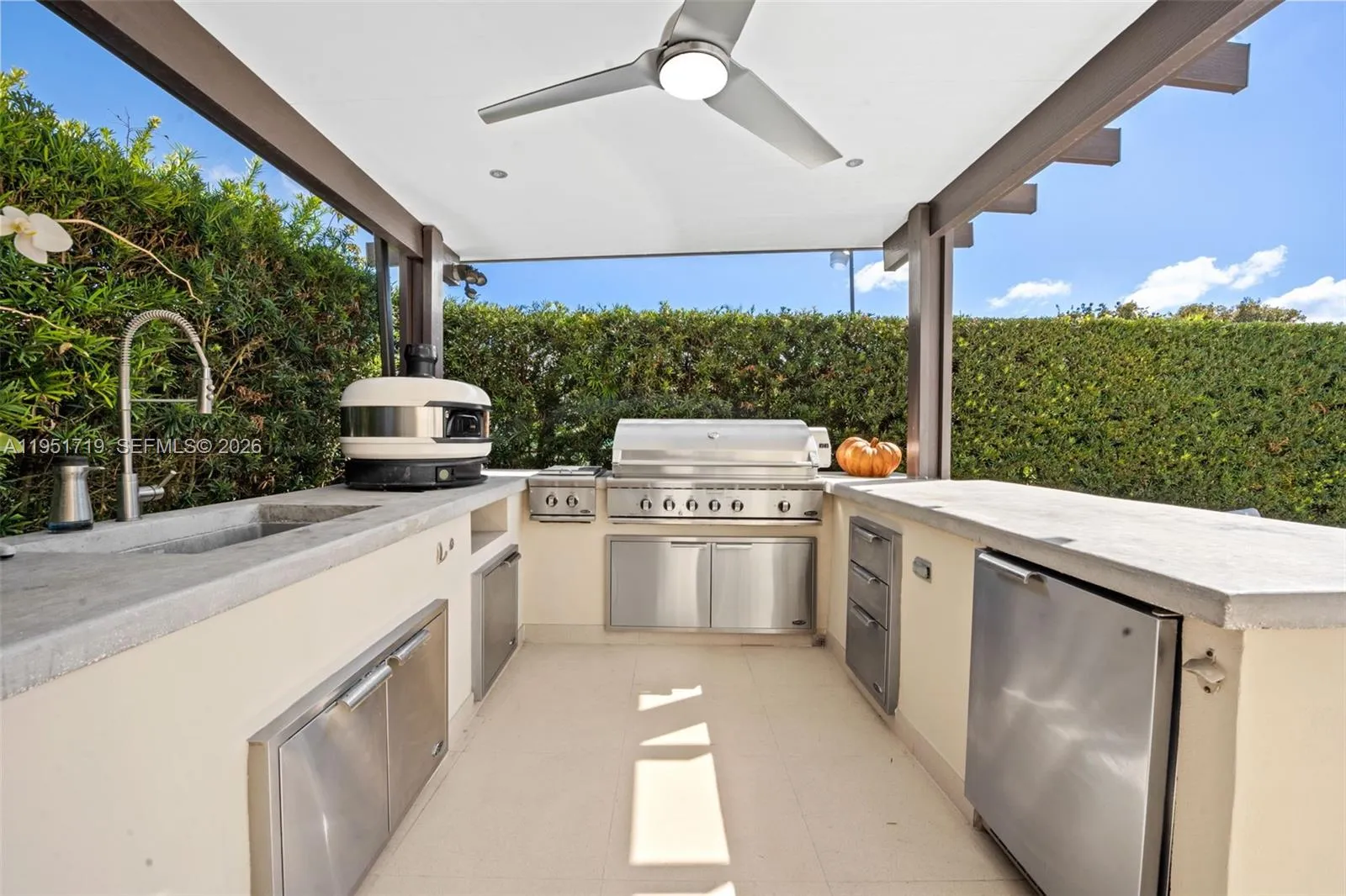 This wide-angle perspective illustrates the property\'s prime location within the quiet, tree-lined residential community of West Miami.