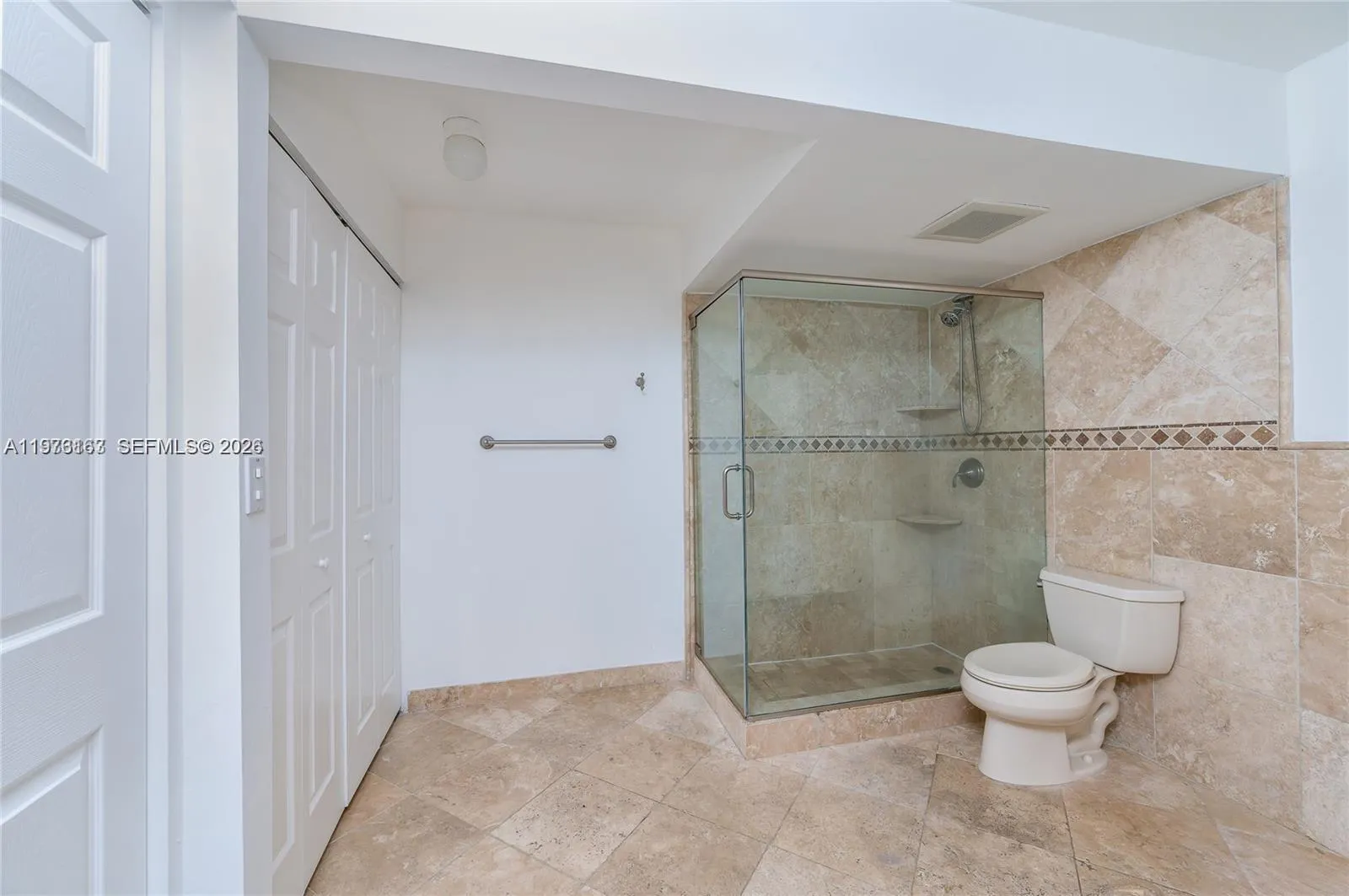 Travertine marble floors and shower