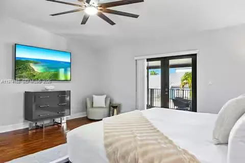 Modern master suite with tropical balcony access!