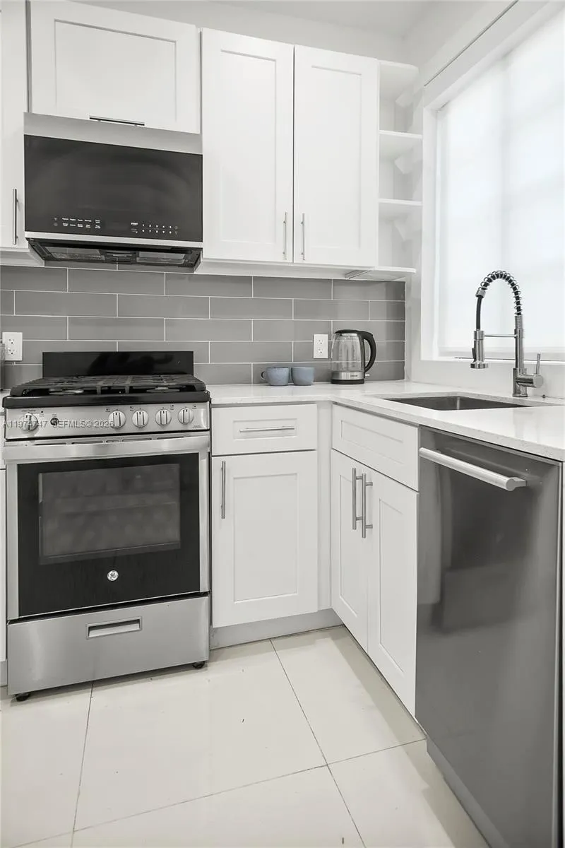 Kitchen - Gas stove and Dishwasher