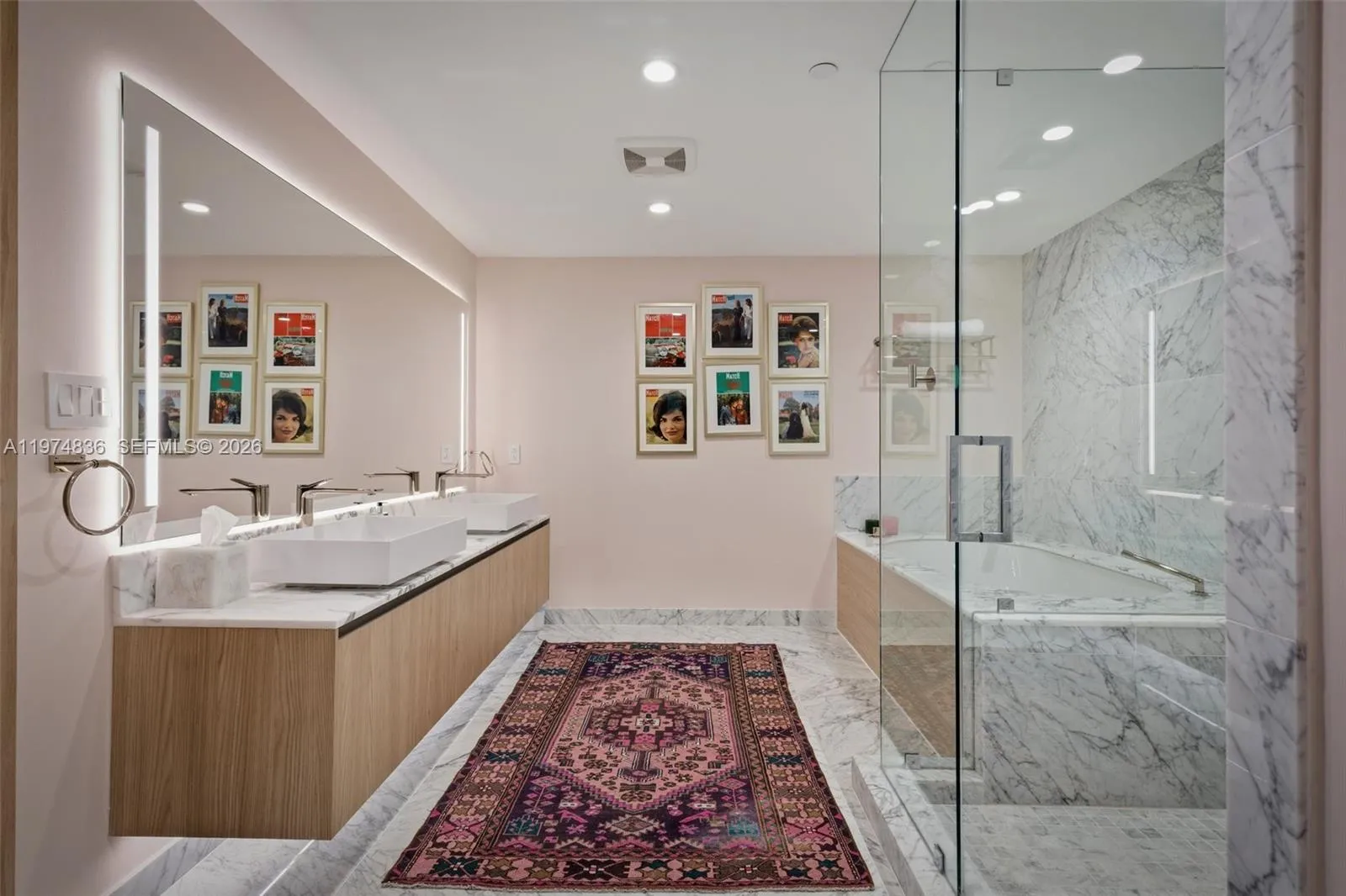 Primary bath with dual sinks and Roman tub