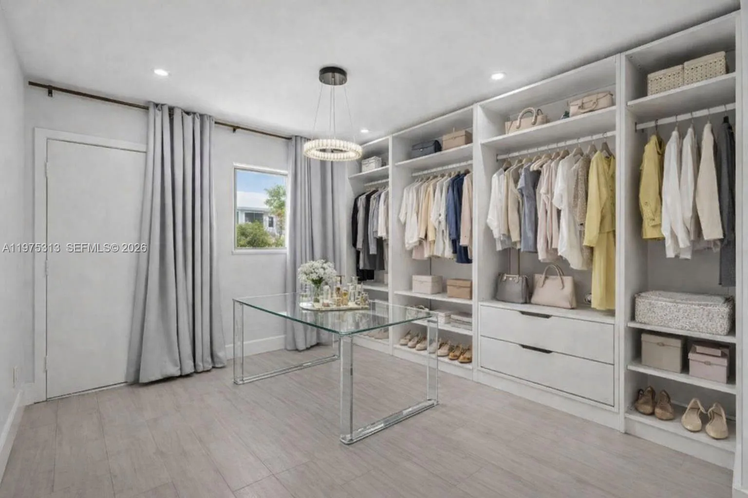 Third bedroom also virtually staged as a walk in closet