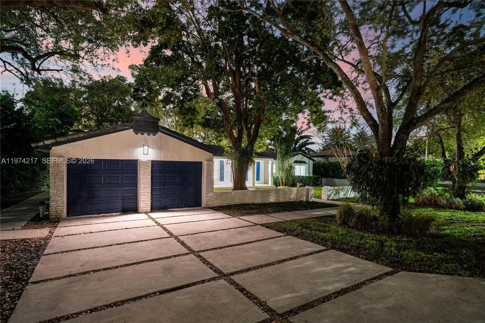 A large driveway added to the 2 car-garage