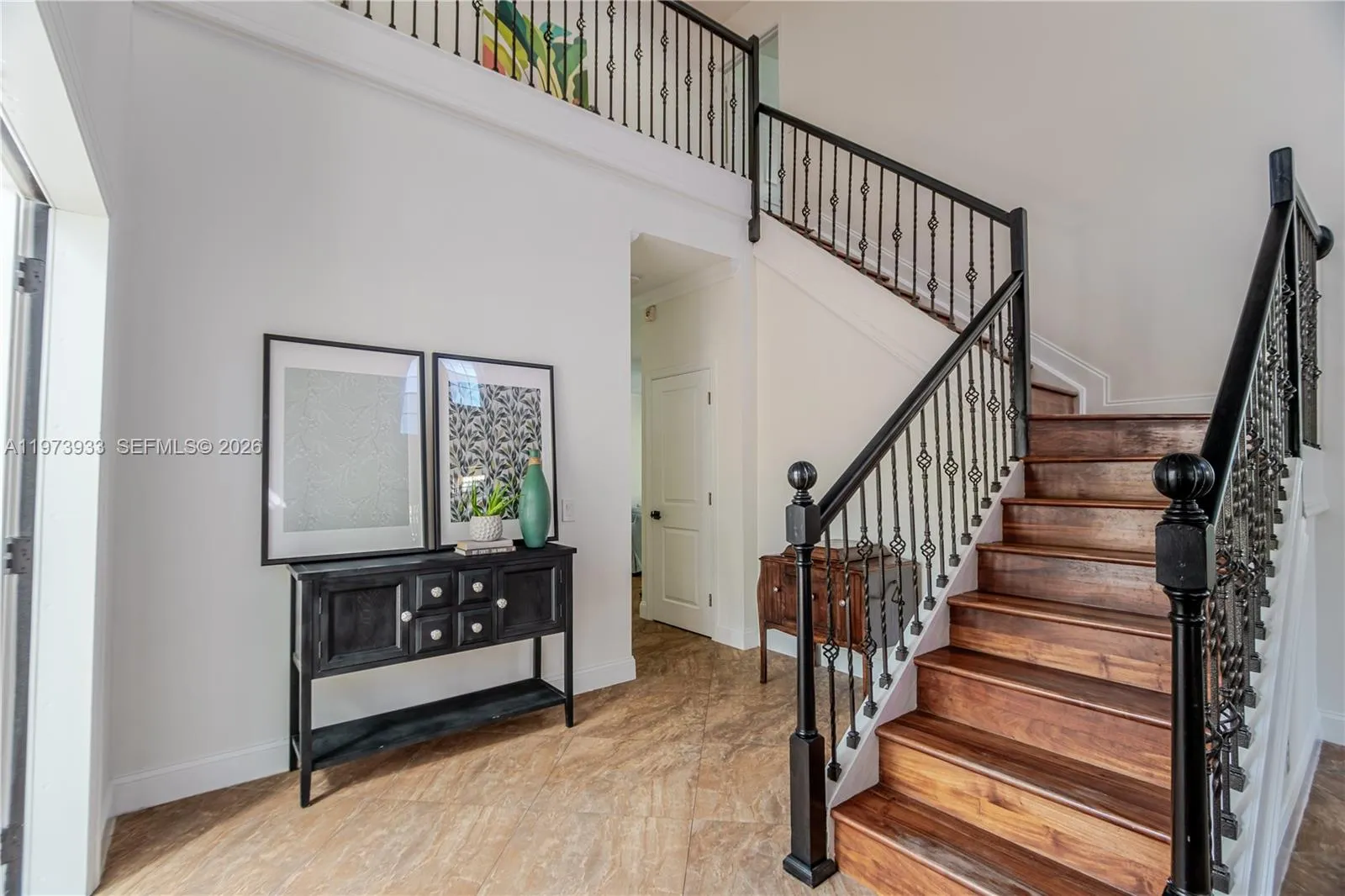 Renovated staircase with double height ceilings