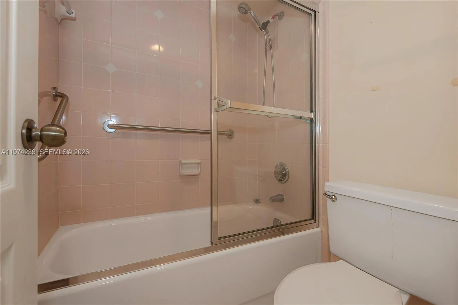 The toilet and tub/shower have their own door for privacy.