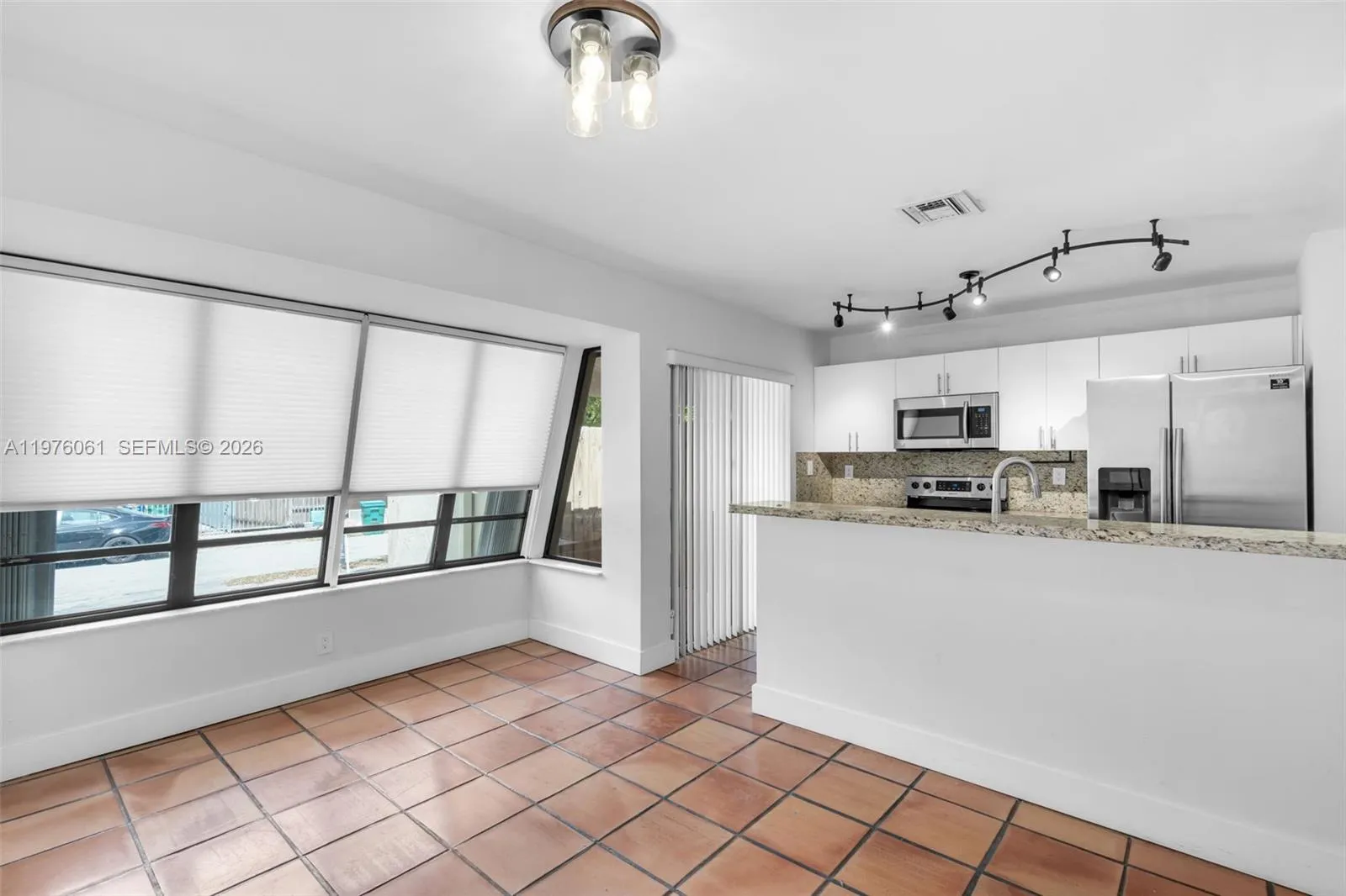 Spacious kitchen with a bar