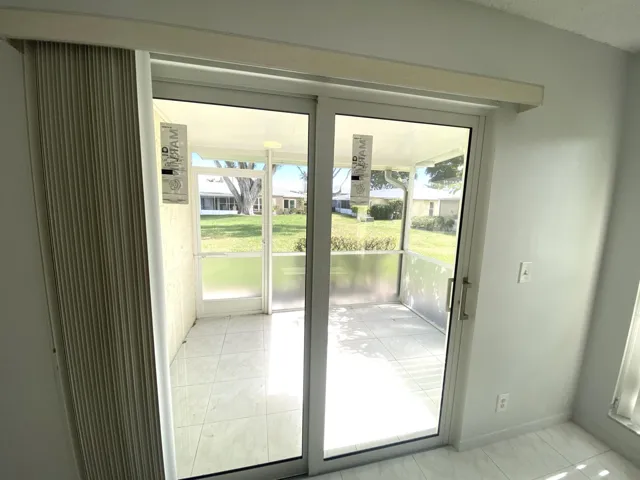 Master bedroom out to screened patio