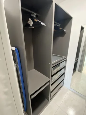 Left side of walk-in closet