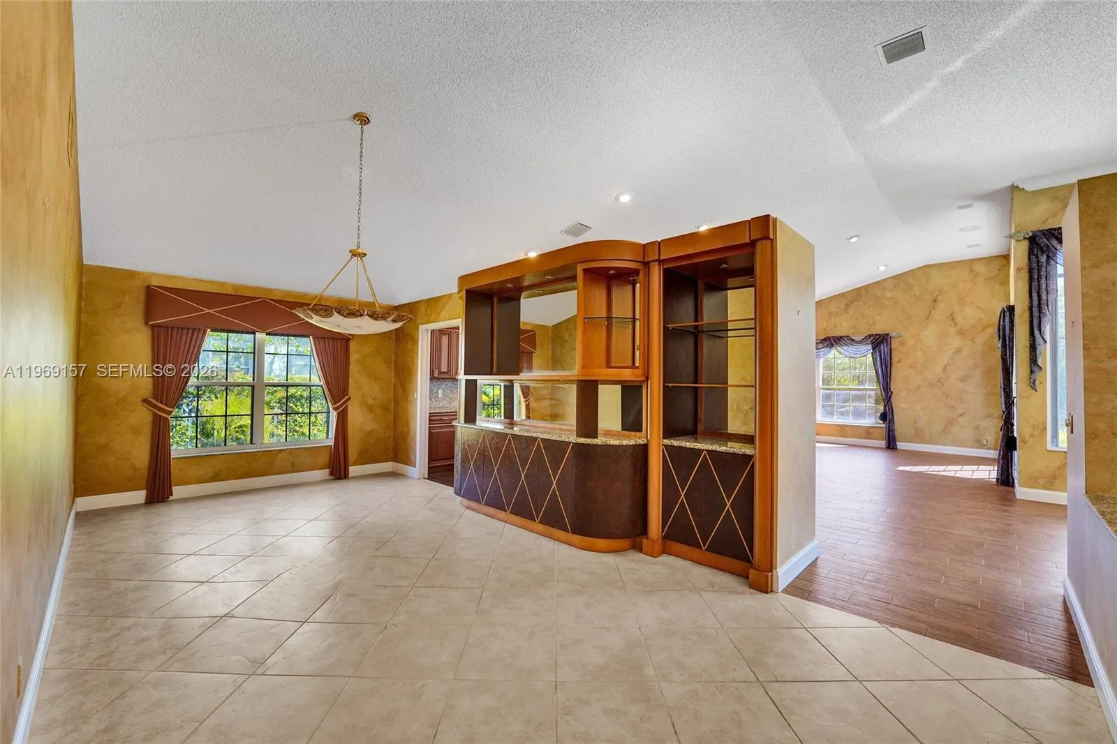 Dining Area; kitchen and family room on other side of the wall