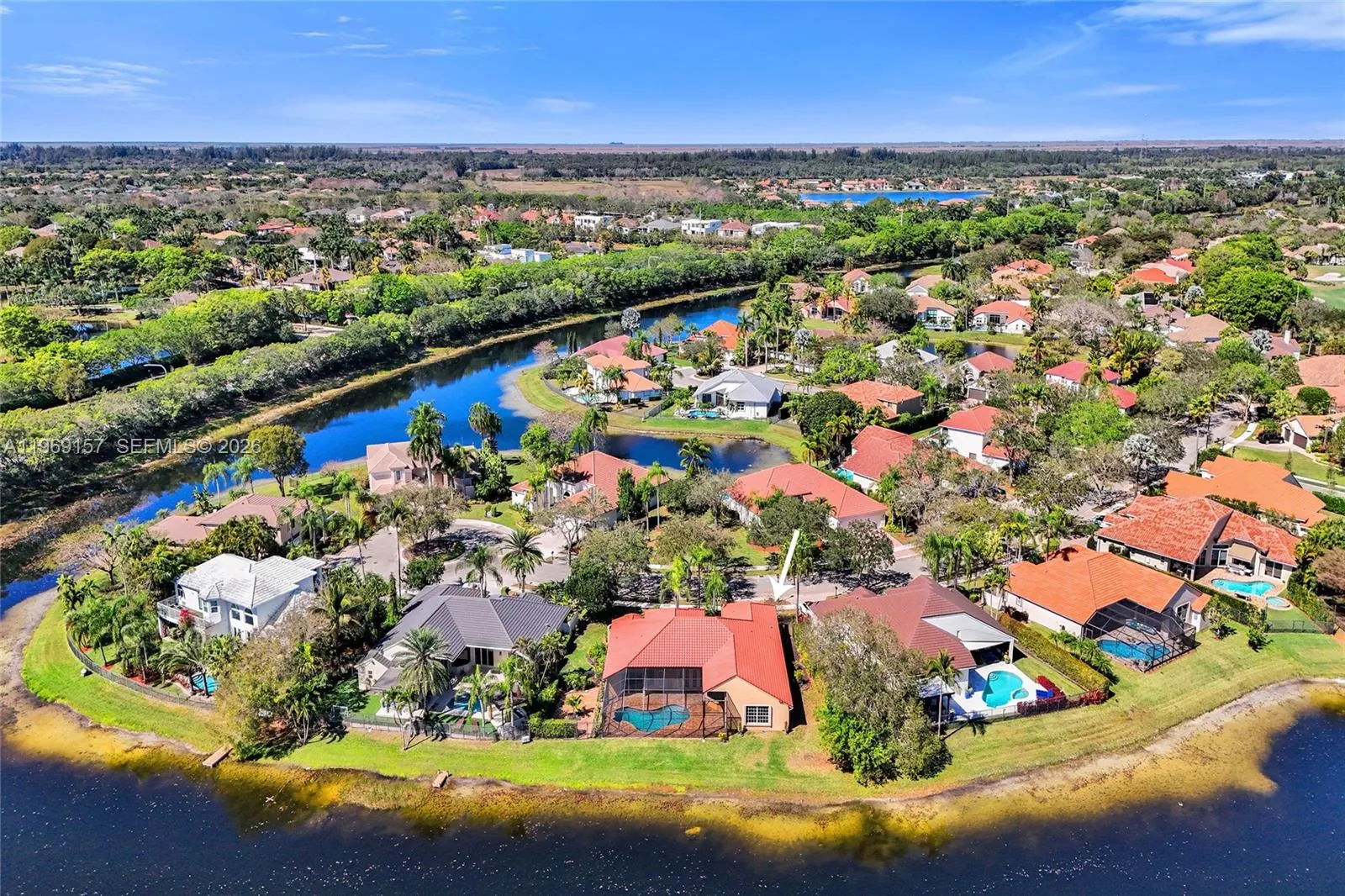 Home is nestled in on the last cul-de-sac of the street with a quiet lake surrounding the area