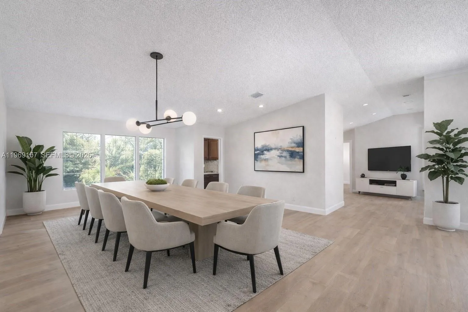 DIGITALLY ENHANCED & STAGED dining area