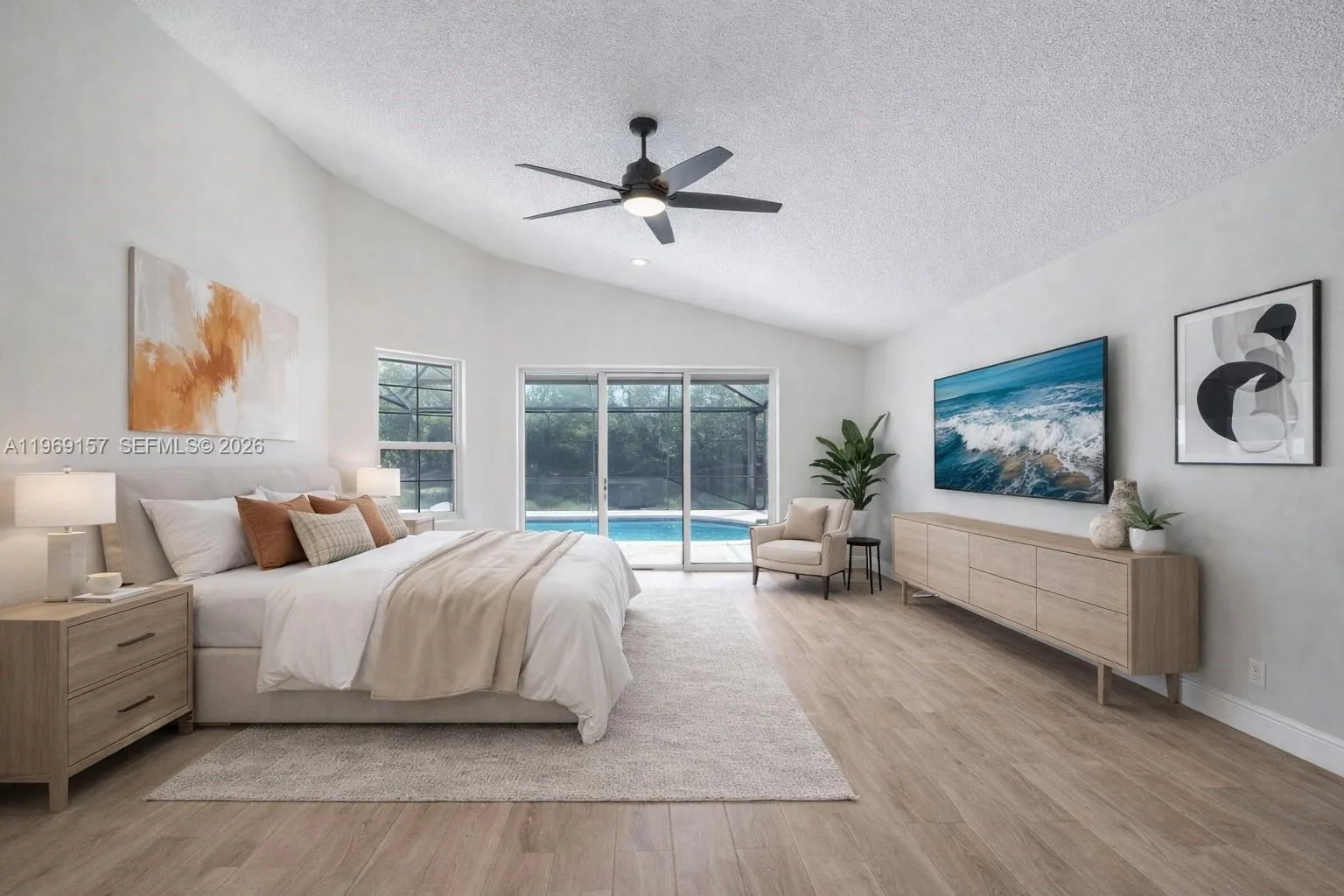 DIGITALLY ENHANCED & STAGED primary bedroom