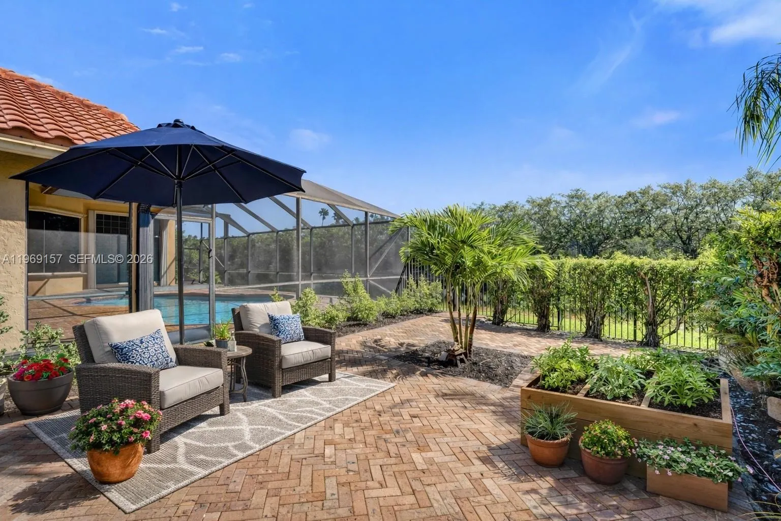 DIGITALLY STAGED with Herb garden and cozy seating