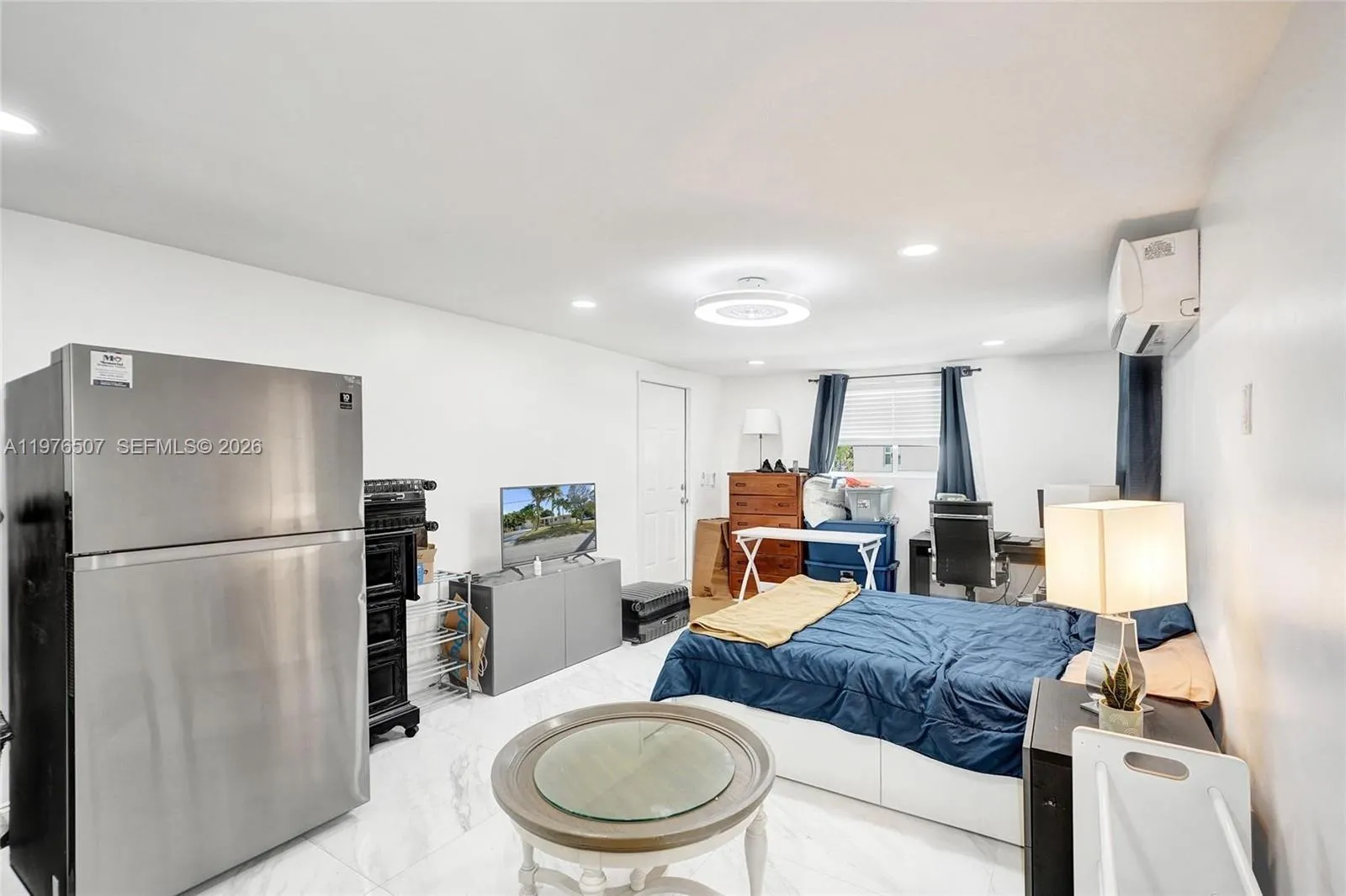 ANOTHER SPACIOUS UNIT THAT COMBINES YOUR SLEEPING AREA WITH YOUR LIVING SPACE!