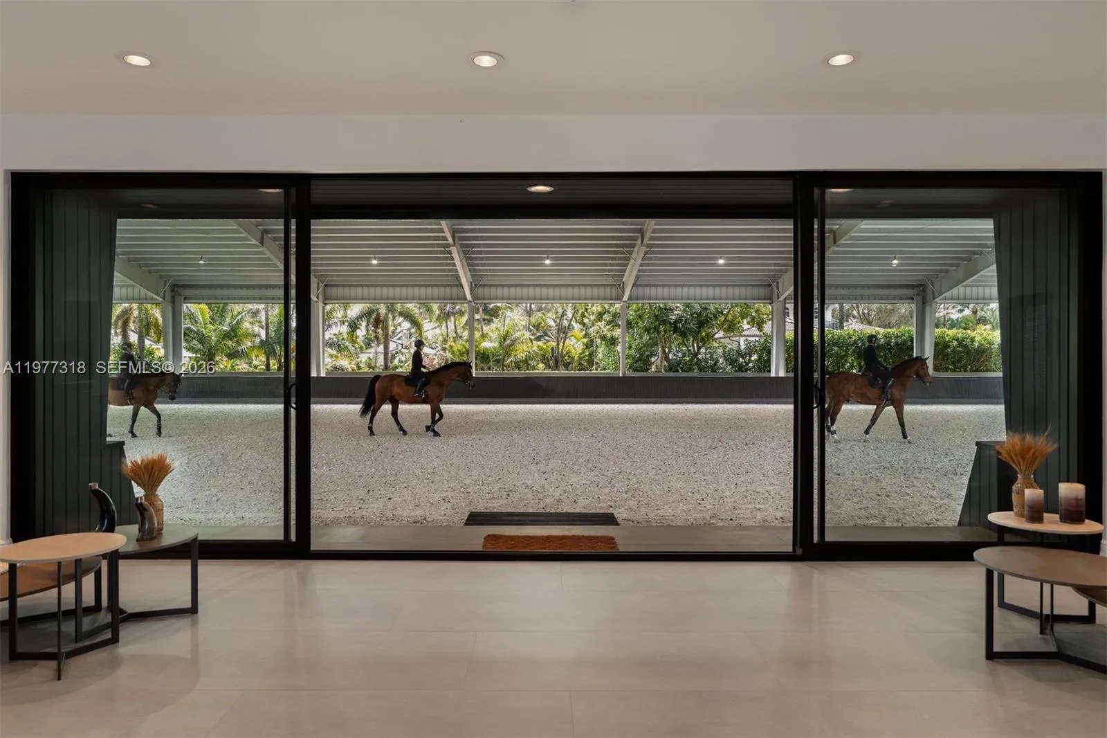 View from inside the clubhouse looking out to the covered arena.