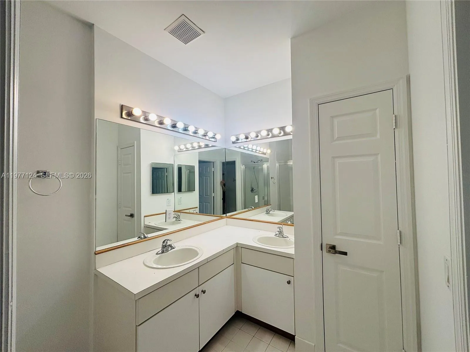 Master Bathroom with private toilet and linen closet