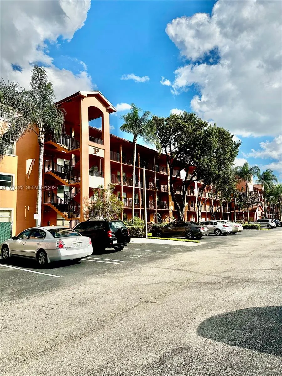 BEAUTIFUL MATURE TREES & GARDENS SURROND THE BULDING-EASY PARKING WITH GUEST SPACES THROUGHOUT