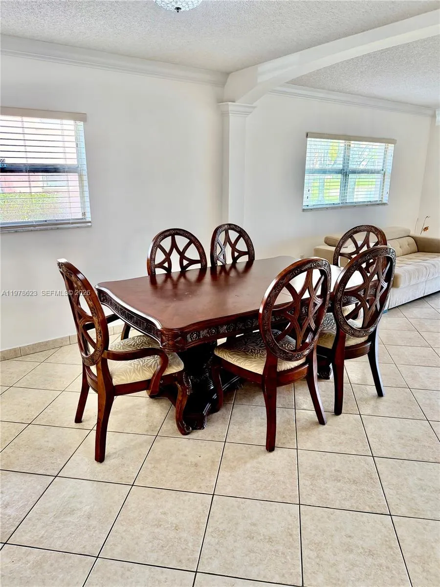 WINDOWS FROM DINING & LIVING AREA-LETS NATURAL LIGHT IN-ENJOY GARDEN & LAKE VIEWS TOO WHILE DINING